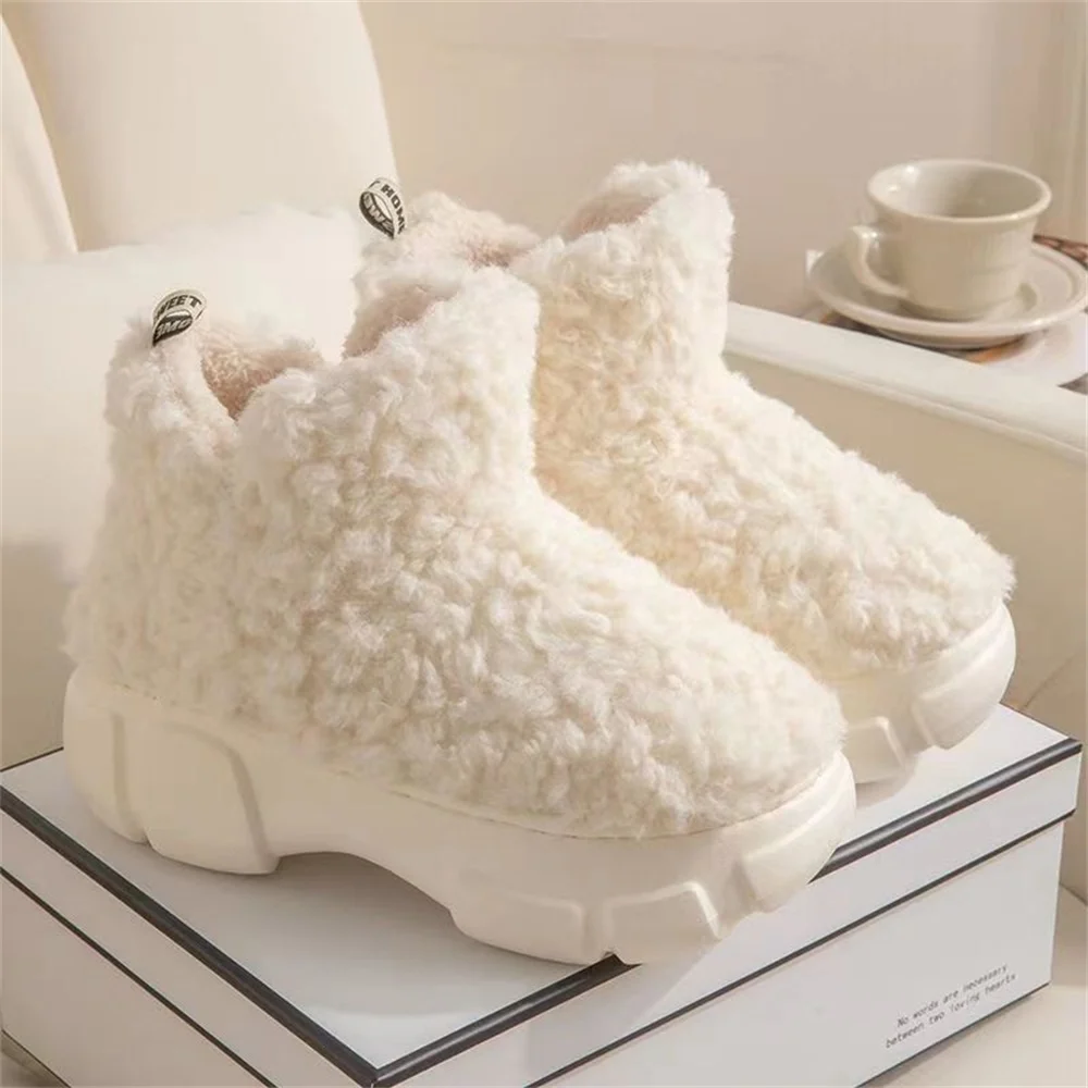 Mao Mao cotton slippers female winter Korean version of simple warm and velvet high-top EVA thick-soled snow boots female