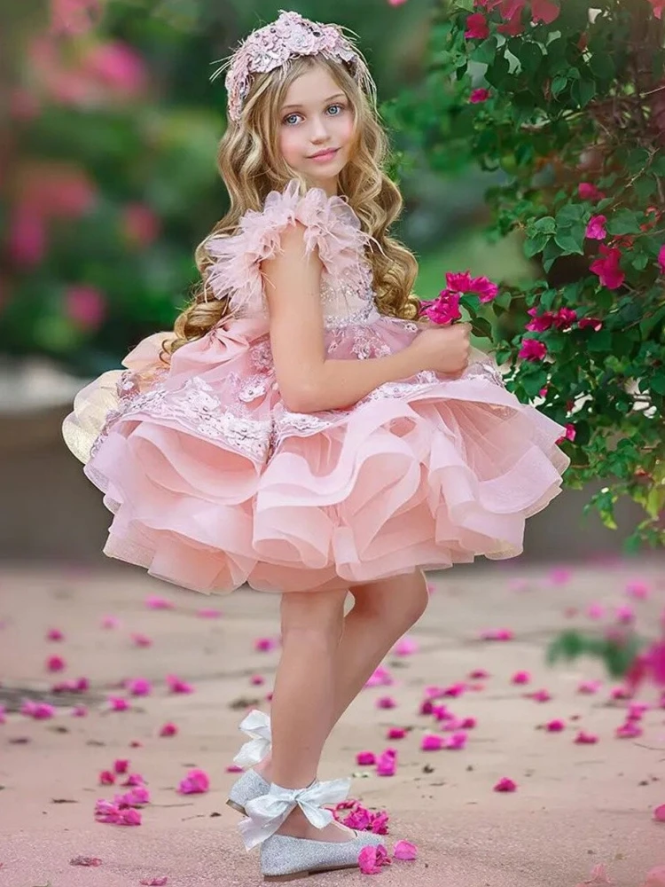 Abiti da ragazza di fiori rosa Tulle Puffy paillettes Appliques con fiocco manica di piume per abiti da prima comunione per la festa di compleanno di nozze