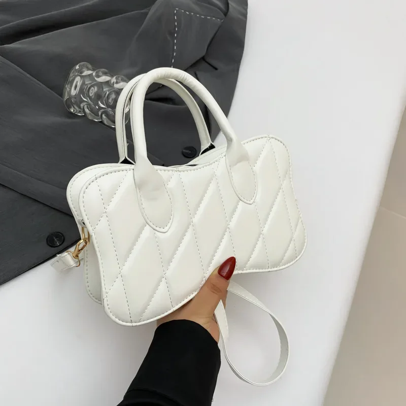 This year's popular fashion Korean version solid color handbag  spring new versatile ins messenger bag small square bag women