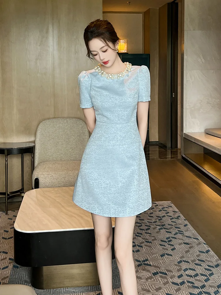 

Coigarsam Women's Summer Dress New Office Lady Solid Short Sleeve Zipper O-Neck High Waist Pearl Light Blue Dresses