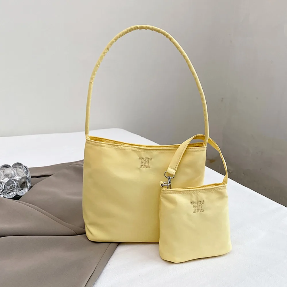 estilo-coreano-nailon-sacola-bolsa-cor-pura-bordado-carta-axilas-saco-all-match-grande-capacidade-pano-bolsa-de-ombro-meninas