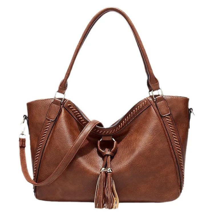 

Women's bag new European and American fashion retro tassel tote bag shoulder bag bucket bag
