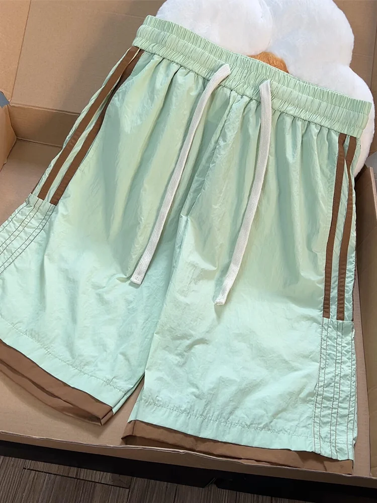 

Qui Dry Sports orts Мужские летние пляжные брюки Dopane Five-Quarter Свободный крой Прямые брюки Нежелезные со средней талией Faionable...