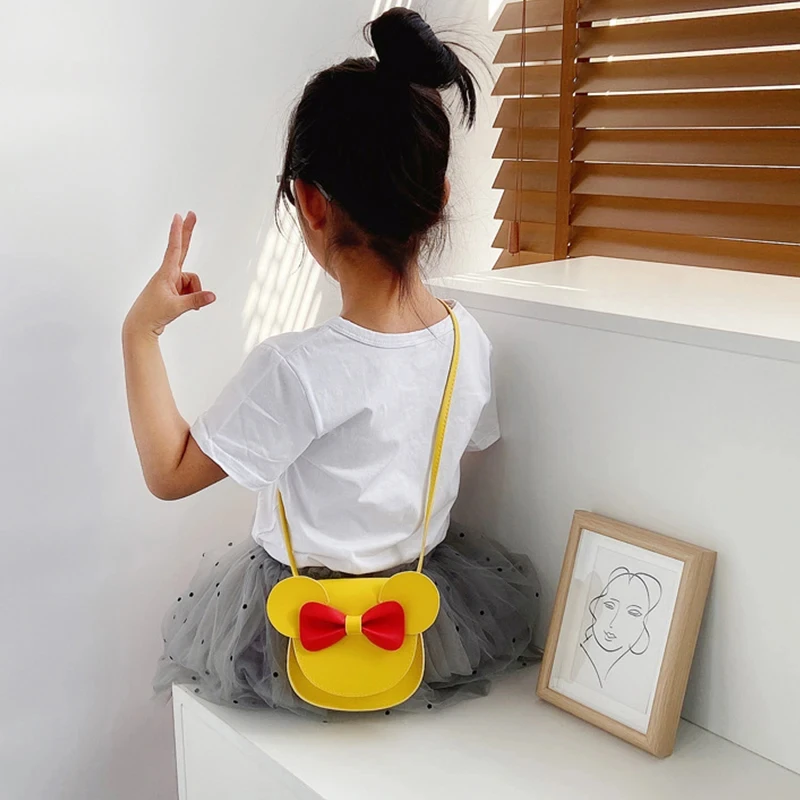 การ์ตูนหนูโบว์สำหรับเด็กทารกกระเป๋าหิ้วน่ารักสีลูกกวาดกระเป๋าหนัง PU สะพายไหล่คาดลำตัวสำหรับเด็ก dompet koin เด็กผู้หญิงเด็กน้อยแบบเจ้าหญิง