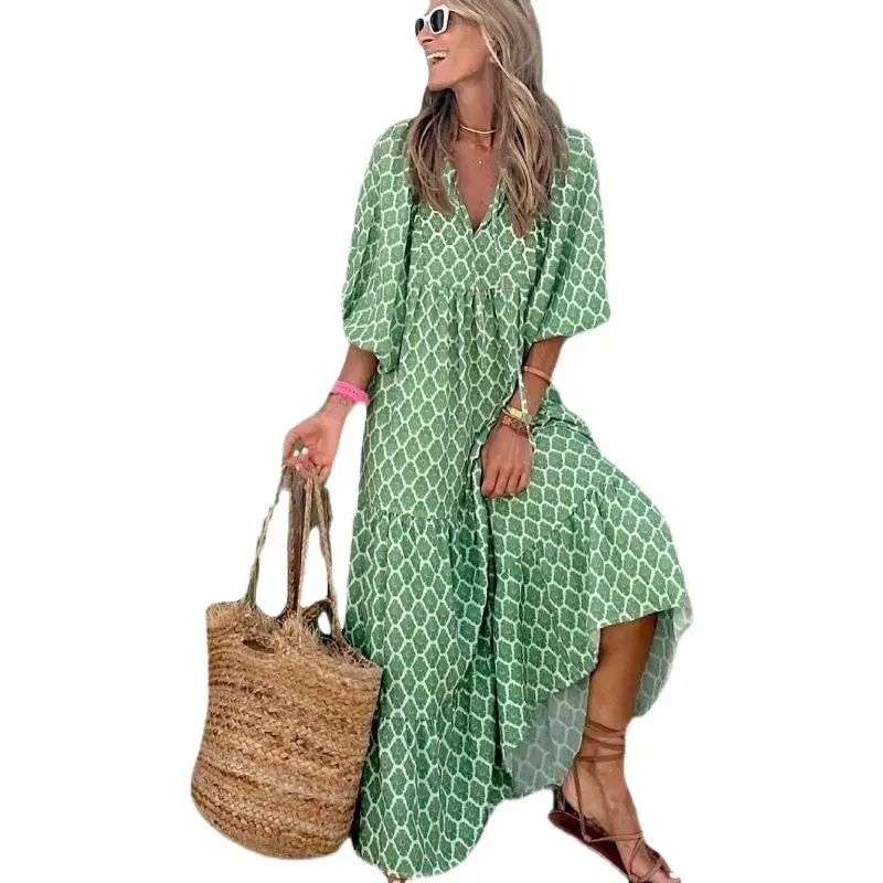 Letnia, luźna spódnica w kwiatowy wzór, idealna na wakacje, długa, z wysokim stanem, okrągły dekolt, krój A, poliester.