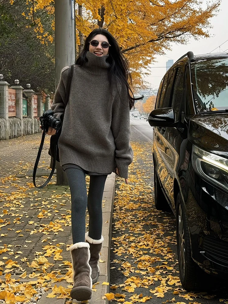 

Winter high-necked pullover cashmere sweater Women's autumn and winter thick wear lazy wind loose long knitted tops.