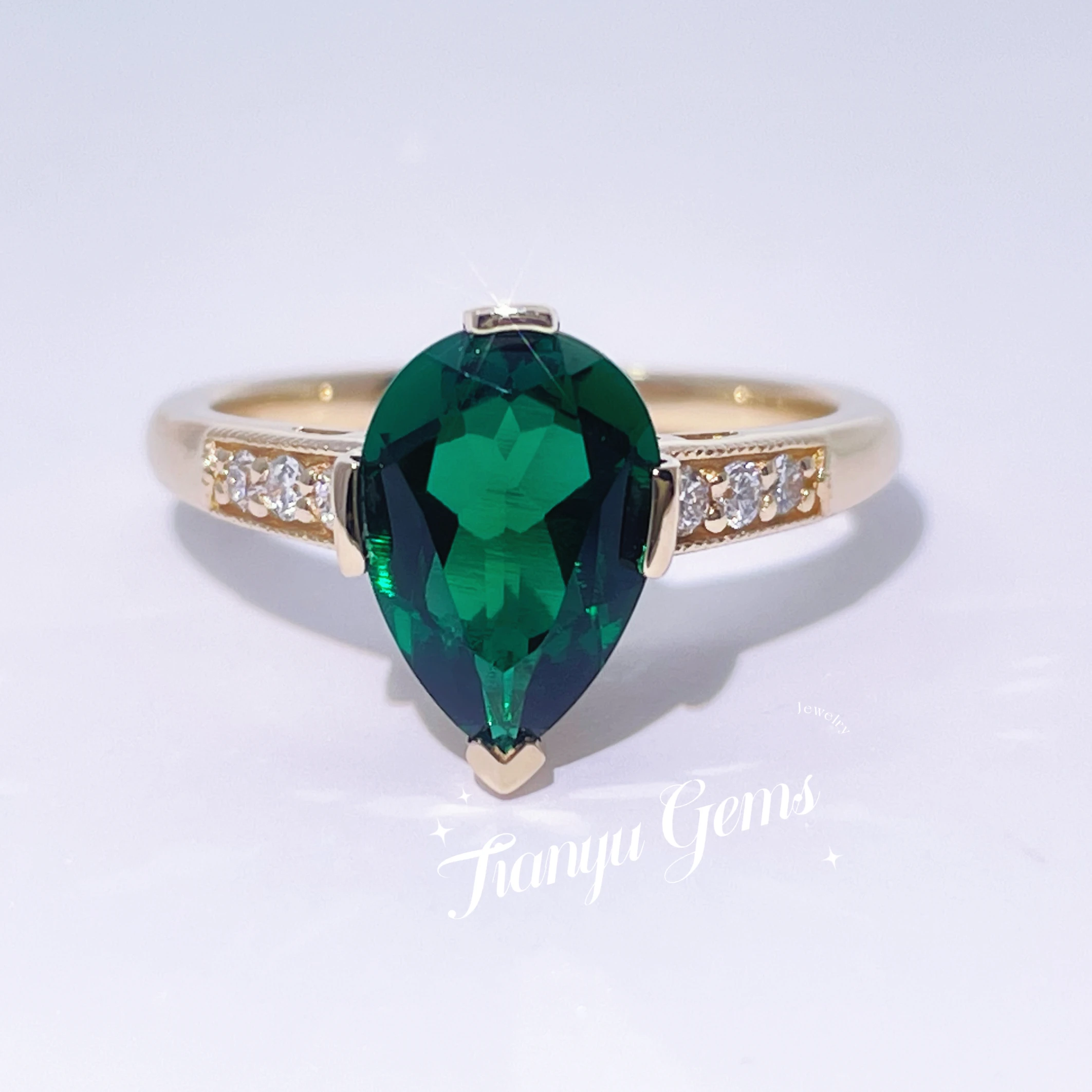 

Tianyu Gems 7x10mm Pear Cut Zambia Emerald Yellow Gold 14k Engagement Ring Lab Emerald Moissanite Diamond Gold Rings for Women