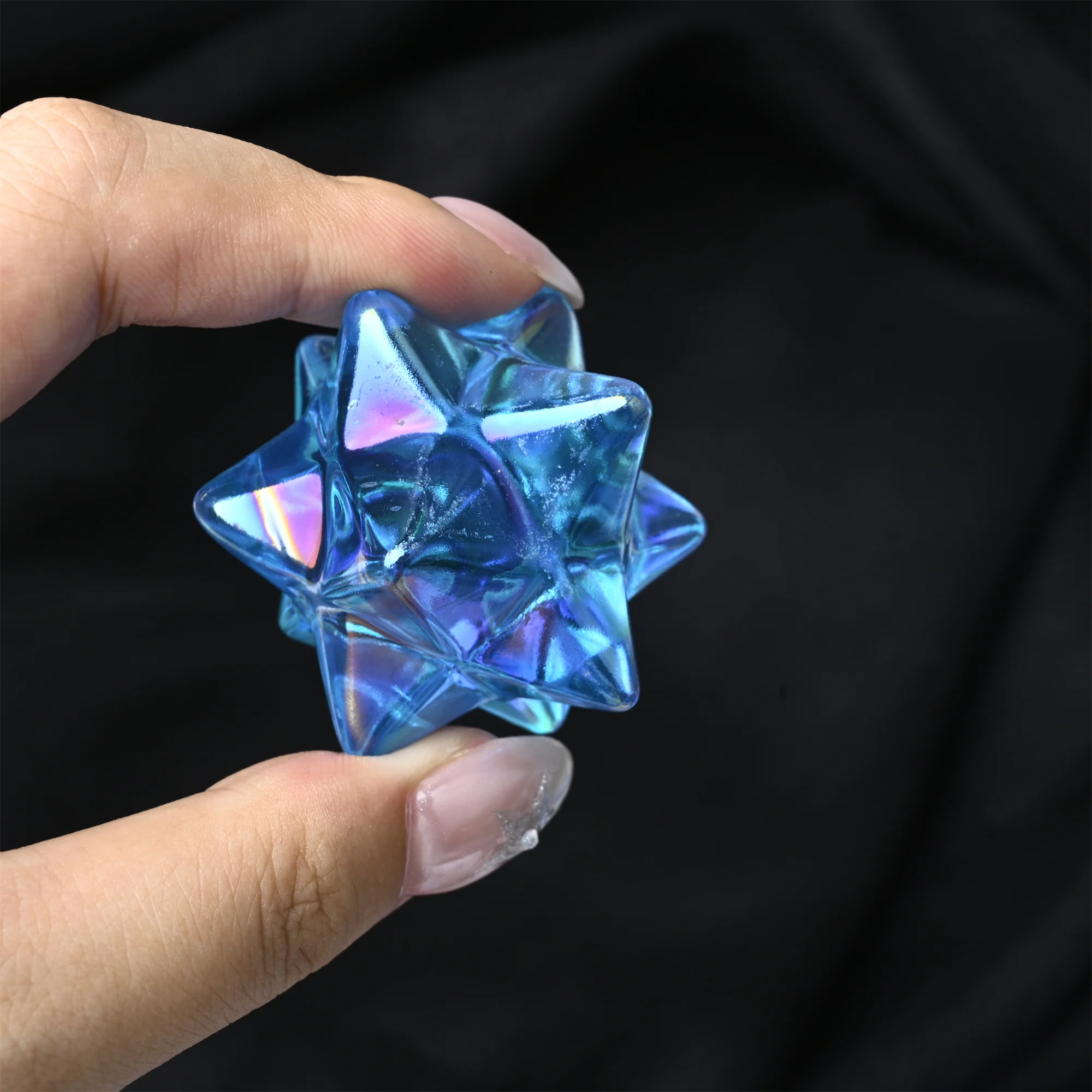 A blue halo stone Mekaba - a polished crystal star sculpture perfect for aquarium decoration, pot filling, jewelry making