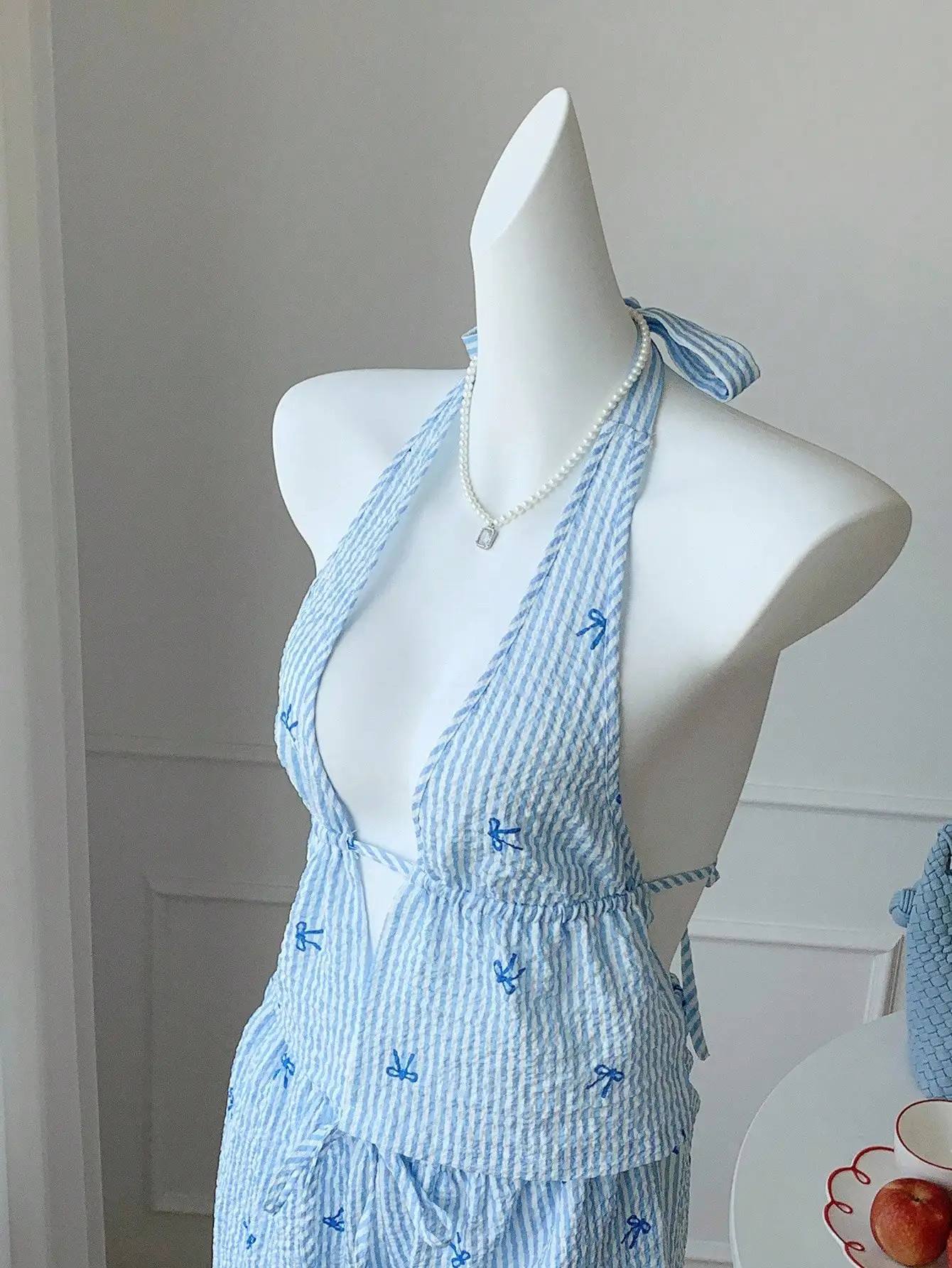 Blauw gestreepte 2-delige set: halter crop top en losse broek met wijde pijpen met strikprint, zomerstrandresortkleding voor dames