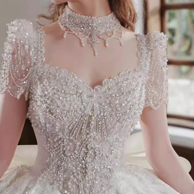 Real Foto Luxe Prinses Vrouwen Trouwjurken Korte Mouw Hoge Hals Kralen Strik Baljurk Bruidsjurk Vestido De Casament