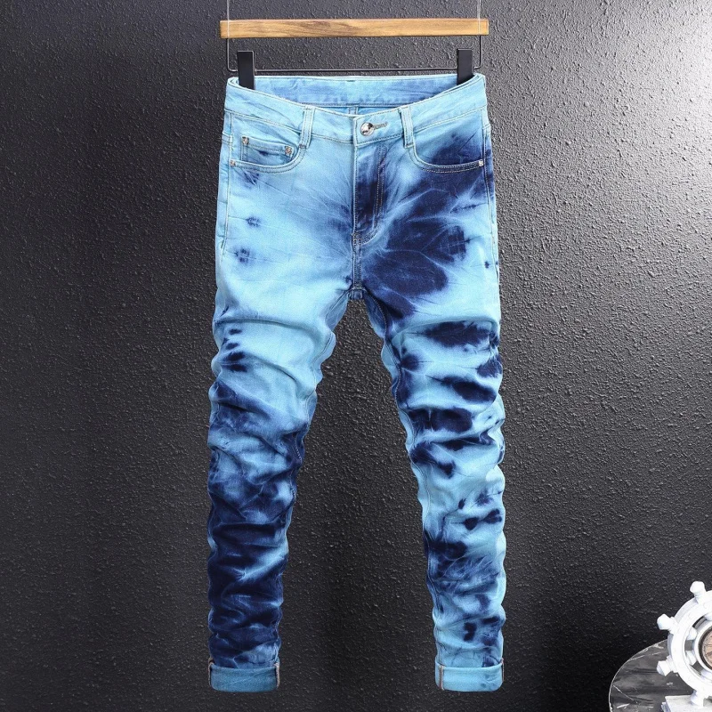 New denim pants for spring 2026 with a unique gradient tie-dye design, slim tapered cut, versatile stylish trousers for young me