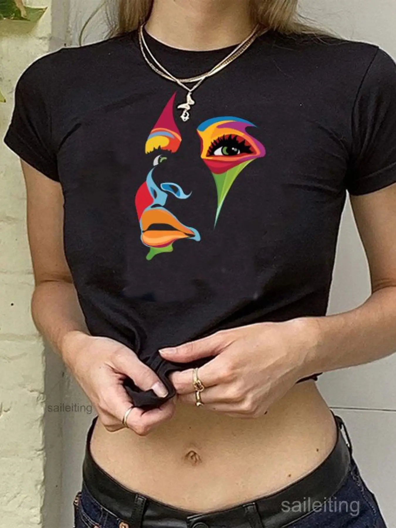 Colorful Abstract Face Graphic Print White Cropped T-Shirt for Women - Vintage Oversized Streetwear Tee with Beige Knit Cardi