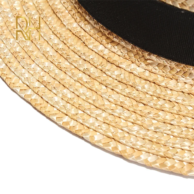 REHOOS القمح الطبيعي القش القارب فيدورا أفضل قبعة مسطحة المرأة الصيف الشاطئ شقة حافة قبعة Bowknot الشريط لقضاء عطلة الطرف