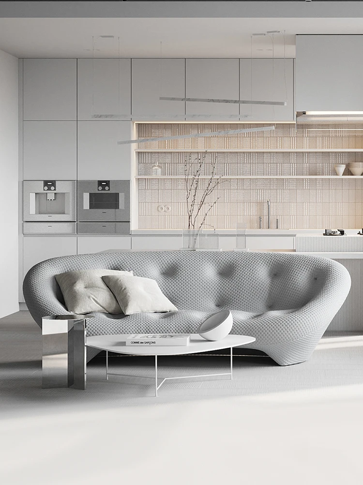 Minimalist freehand space, curved shell sofa, living room, large flat floor