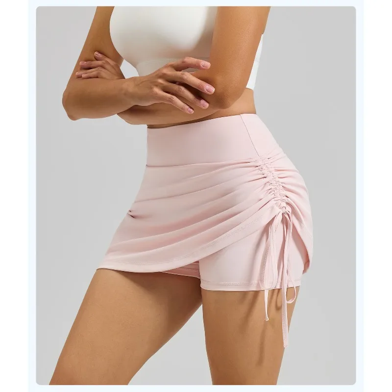 กระโปรงกีฬาแบบรัดรูปพร้อมกางเกงซับในสำหรับผู้หญิง ยืดหยุ่นสูง แฟชั่นลำลอง กระโปรงฟิตเนส ดีไซน์สองชิ้นในตัว กระโปรงโยคะ