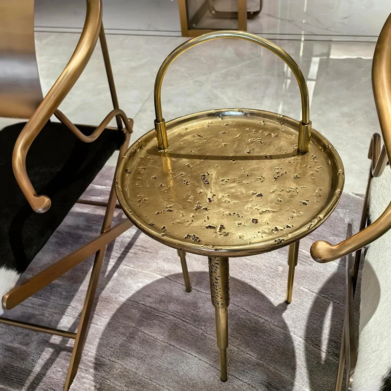 

Italian light luxury metal coffee table household living room art round edge table