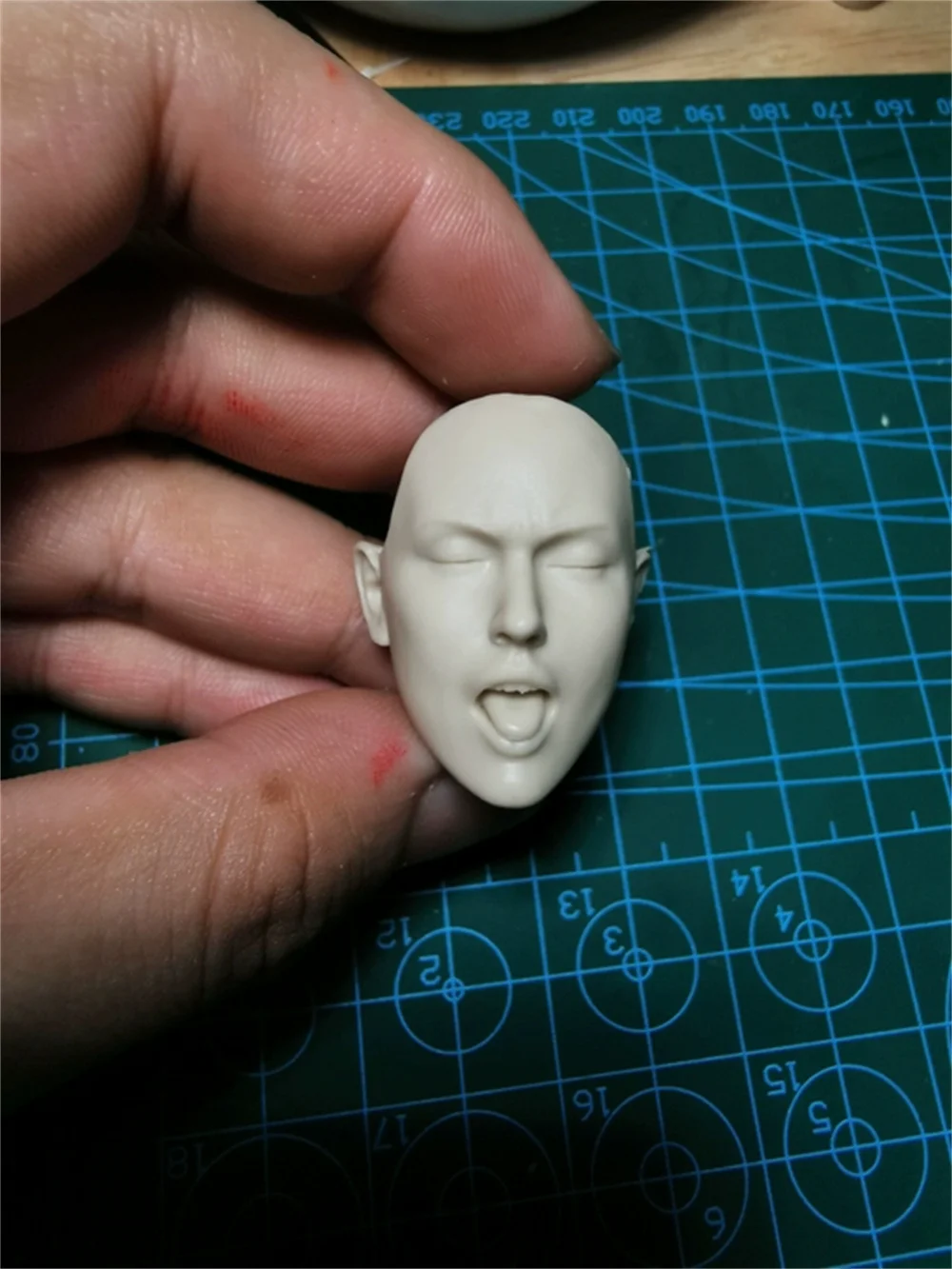 

Unpainted 1/6 Beauty Female Head Sculpt Eyes Closed and Tongue Out ExpressionCarved Model Fit 12" Action Figure