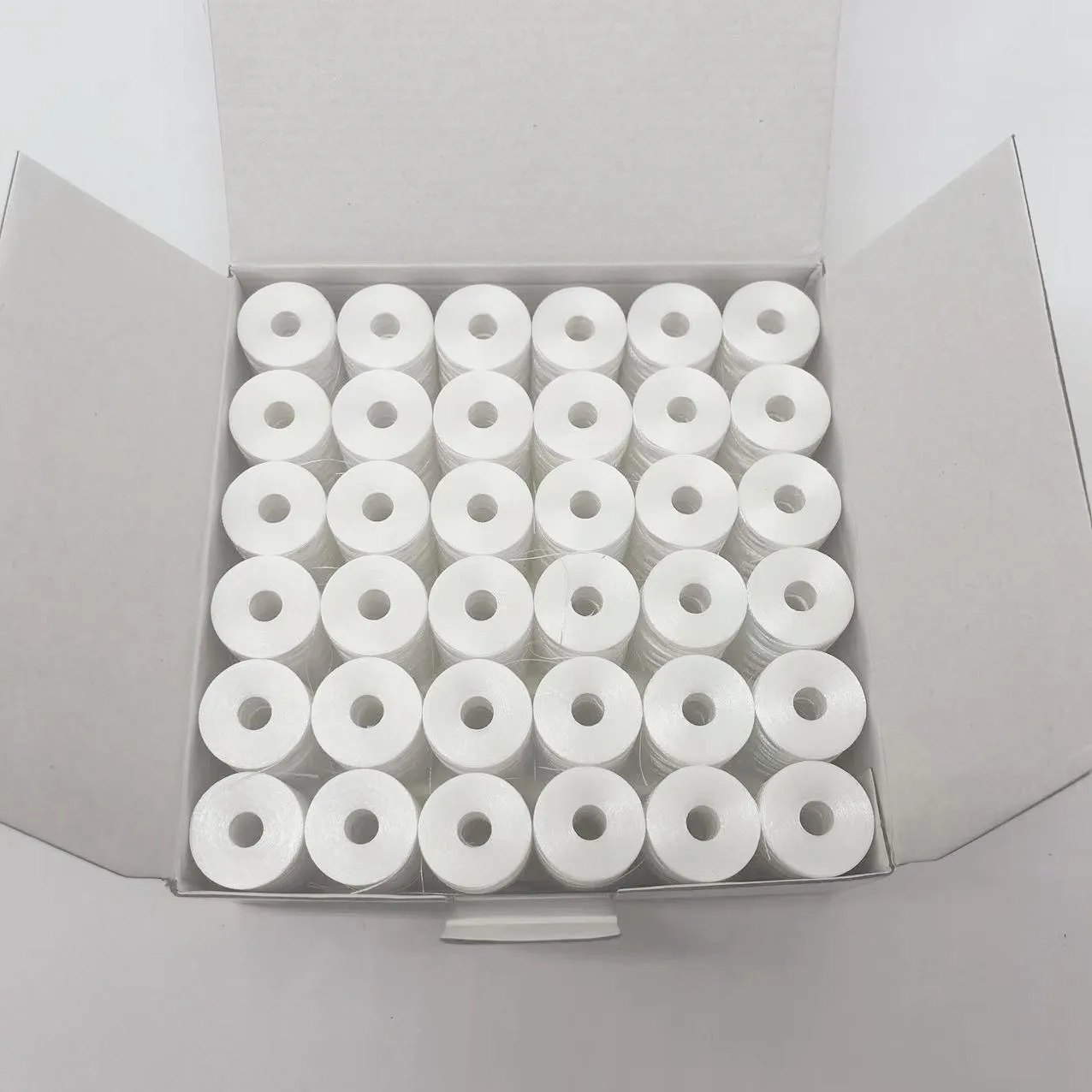 White Color black color Sideless paper side Type L 75D/2 144PCS/BOX for  Embroidery Machine Pre-wound Bobbin Thread