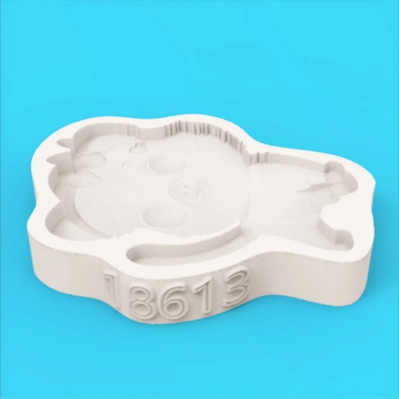 Silicone Mold for Making Fondant Chocolate Cookies with a Playful Little Tiger Design Wearing a Polka Dot Bow and Sticking Out Its Tongue