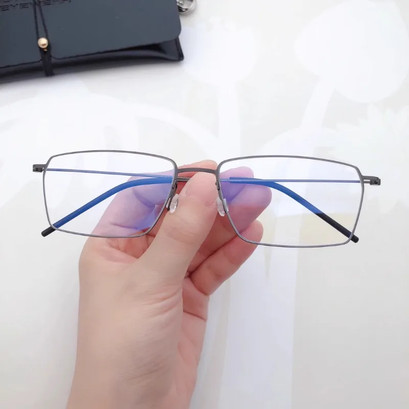 Ultra-thin Ultra-light Pure Titanium Box Men and Women Fashion Thin Leg Thin Frame Myopia Glasses New Optical Frame Business.