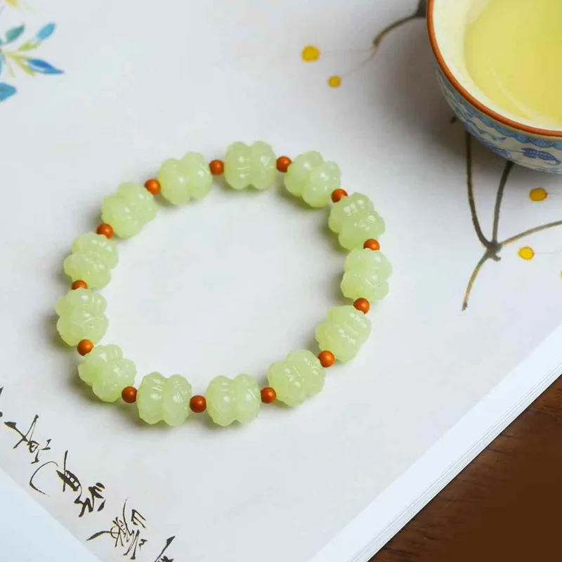 

Natural Hetian Jade Ruoqiang Yellow Old Material Twin Bracelet With Certificate