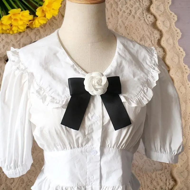 دبوس بروش ربطة عنق سوداء مصنوعة يدويًا؛ تصميم أنيق على شكل زهرة للبدلات النسائية والقمصان البيضاء