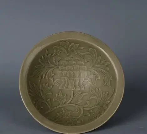 Antique collection &decoration: Double-layer porcelain rain-hat bowl with carved patterns from Yaozhou Kiln in the Song Dynasty