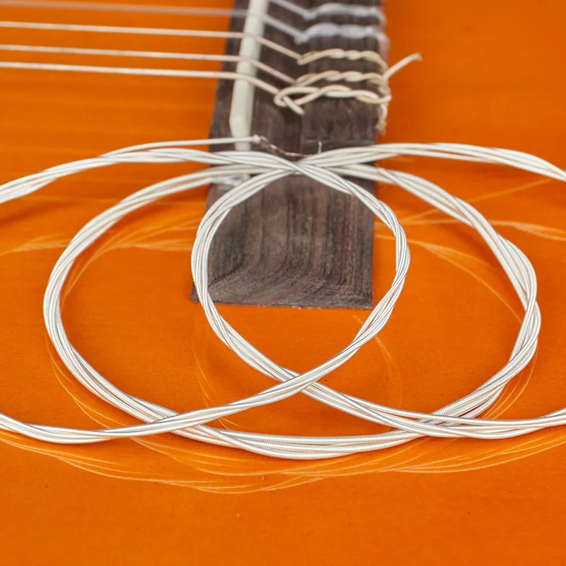 6Pcs/Set Super Light Tension Classical Guitar Strings Clear Nylon Core Silver‑Plated Copper Wound for Beginner Classic Guitar Ac
