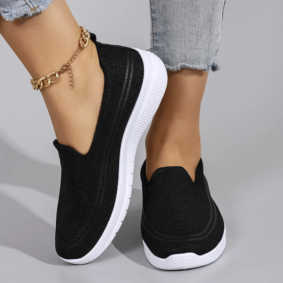 รองเท้าลําลองสตรีฤดูใบไม้ผลิที่สะดวกสบาย ระบายอากาศได้ น้ําหนักเบา และทนต่อการสึกหรอพร้อมพื้นรองเท้านุ่มสําหรับคนขี้เกียจในการเหยียบ