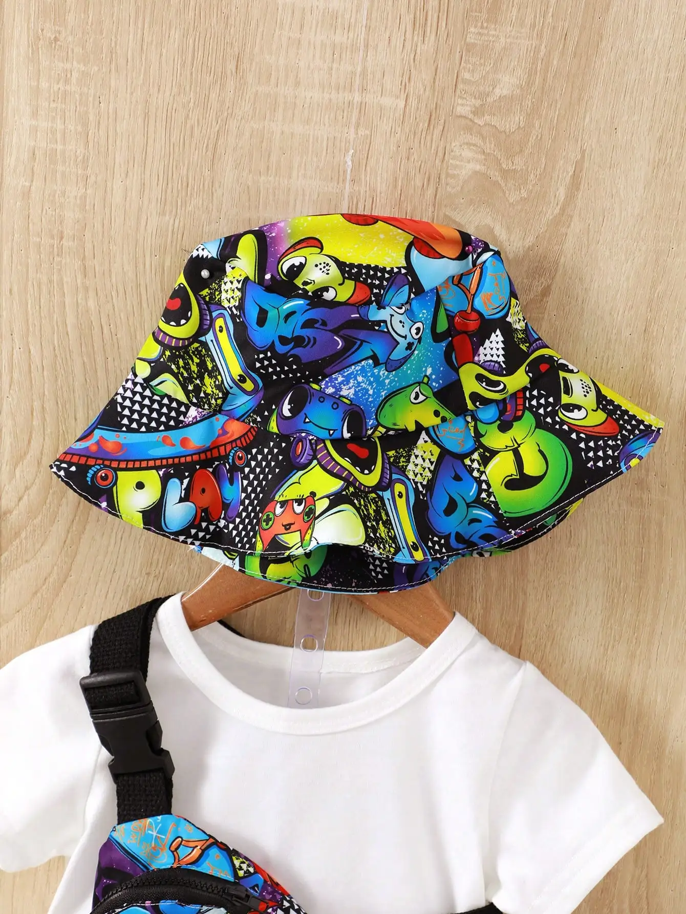 Fashion Street Style Baby Boy 4-Piece Cartoon Little Monster Printed Hat + Crossbody Bag + Pants + White Short-Sleeved T-Shirt