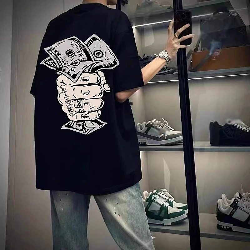 

Oversized Streetwear Tee, Unisex Cotton Short-Sleeve, Money Fist Graphic Print, Hip-Hop Dollar Bill Design