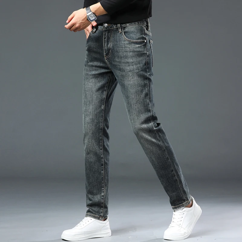 High-end fashion Slim straight jeans men\'s business stretch embroidery thick bottom denim pants