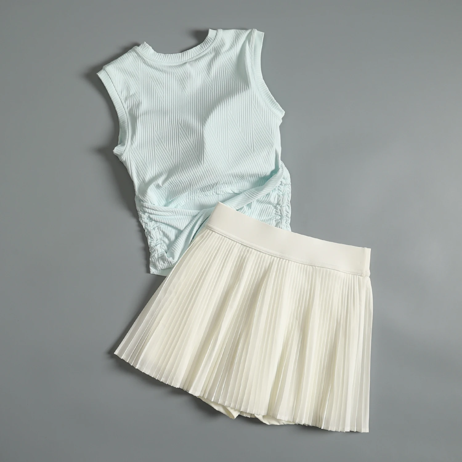 Traje deportivo de bádminton para mujer en verano, ropa de entrenamiento para correr de alta gama, ropa de secado rápido, Falda plisada deportiva de yoga antiexpuesta