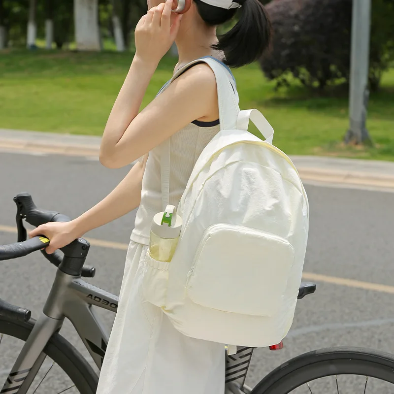 Women's Cream Foldable Backpack with Front Zipper Pocket Side Water Bottle Holder Casual Lightweight Daypack for School Travel