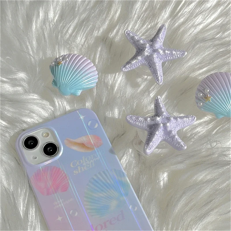 スタイリッシュなヒトデ型シェル携帯電話スタンド、iPhone 17/16 Pro Max対応、キュートなユニバーススタンドアクセサリー