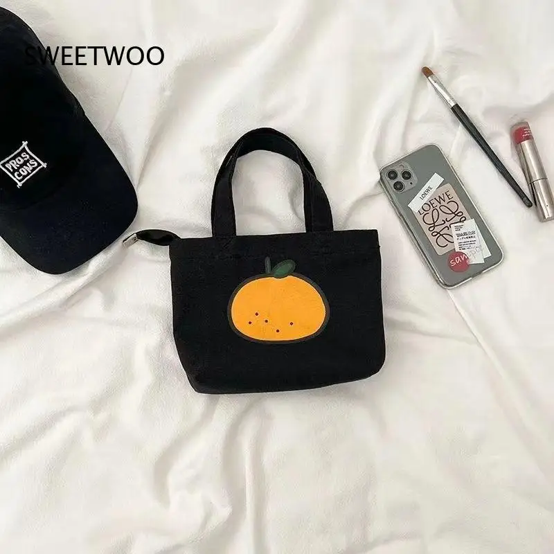 2026 Cute Orange Print Mini Canvas Hand Pouch Casual Daily Cosmetic Handbag