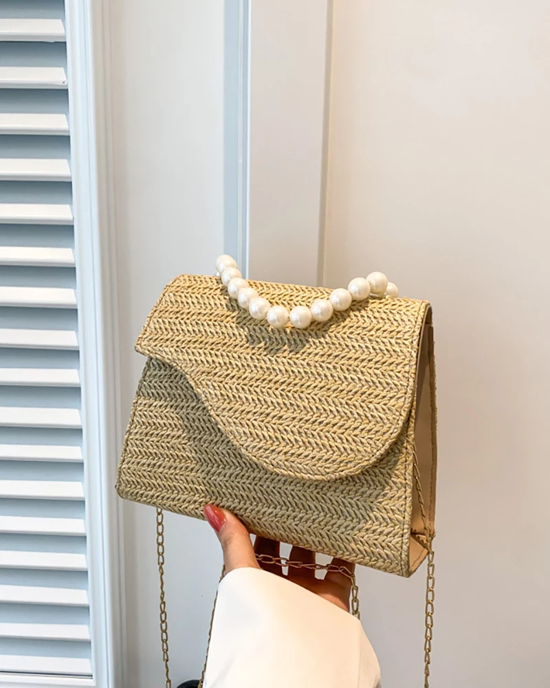 Bolso bandolera con correa de cadena trenzada con decoración de perlas