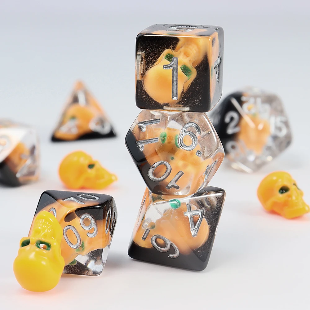 A Set of Pumpkin-Colored Skull Core-Spun Resin Dice, Halloween Multi-Element Ensemble Dice, Various Game Accessories and Supplies