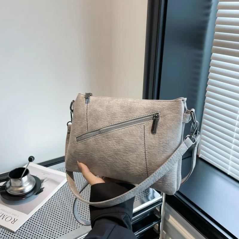 

2025 New High-end Ladies Leather Hand Bag Luxury Brand Famous Designer Simple Paris Elegant​