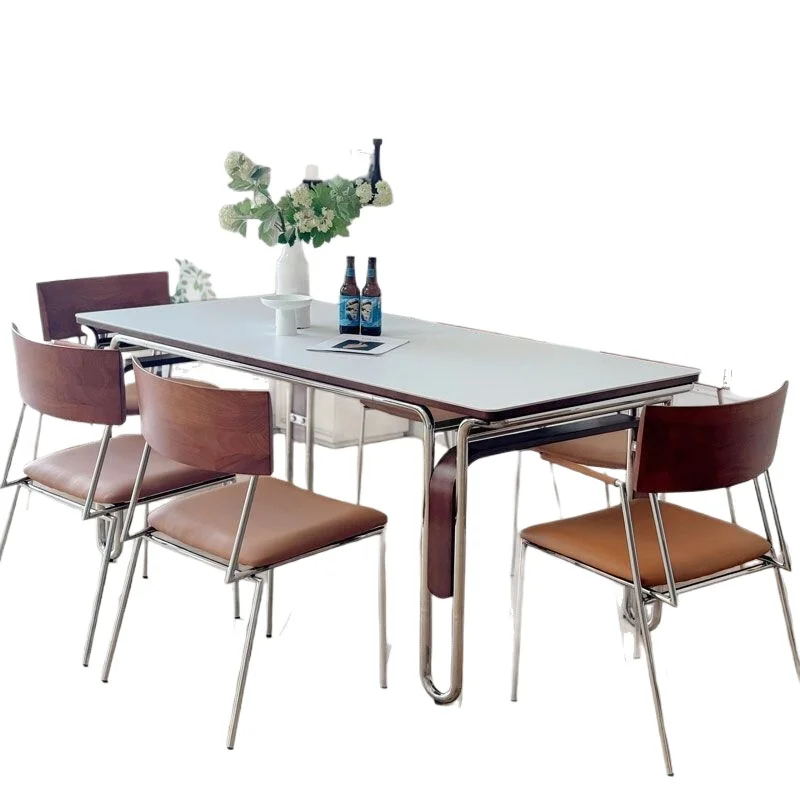 

Medieval rock slab dining table and dining chair combination, small household new rectangular retro dining table