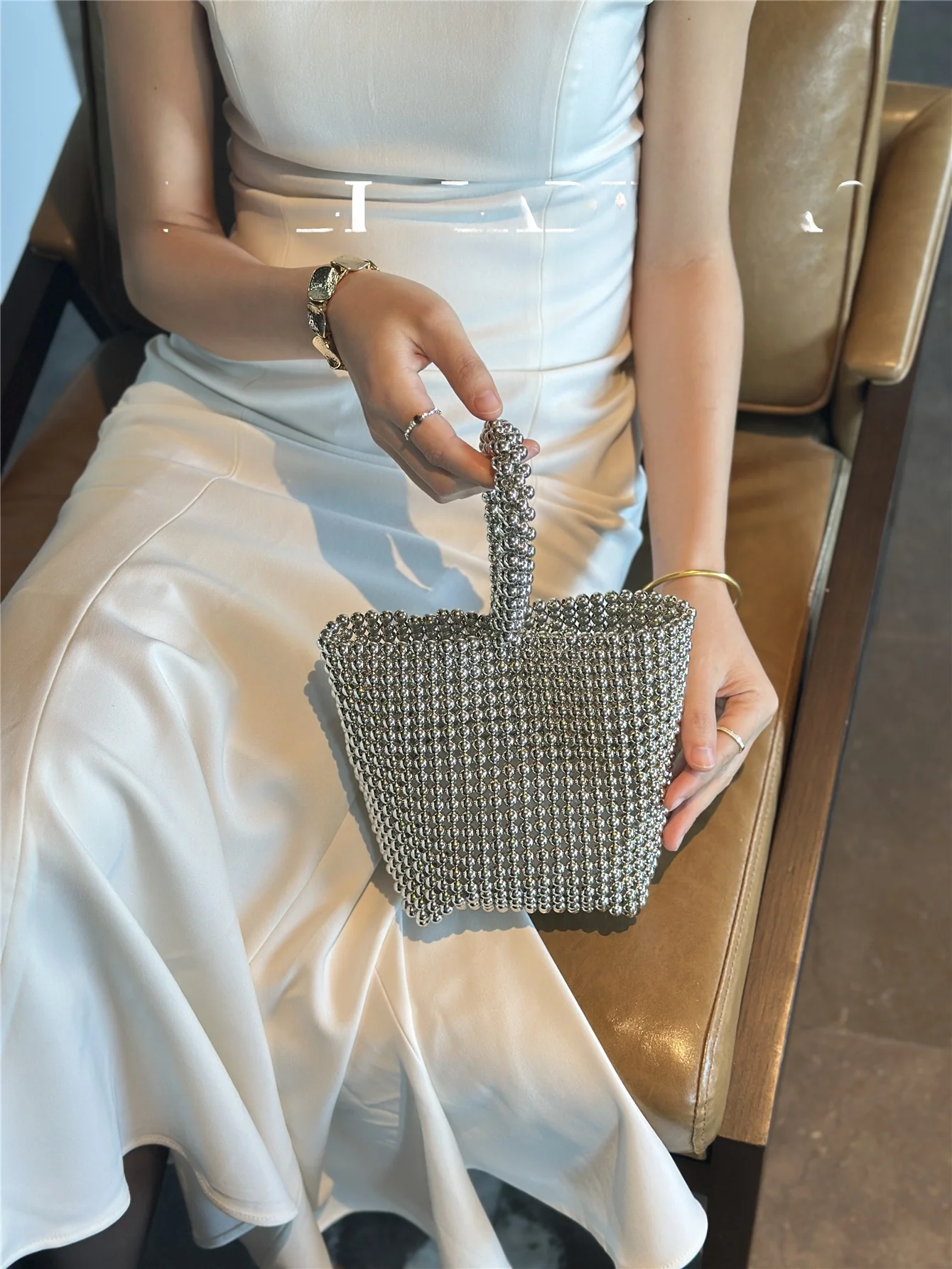 

Fashionable Pearl Evening Bag Women's Crossbody Shoulder Bag Woven Beads Single Strap Handbag Dongda Gate New 2026 Model