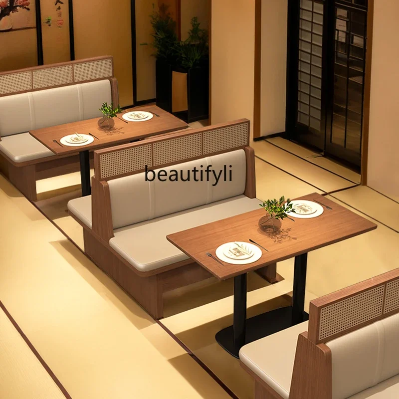 

Restaurant booth sofa Commercial tea house Chinese restaurant, rattan tables and chairs against the wall