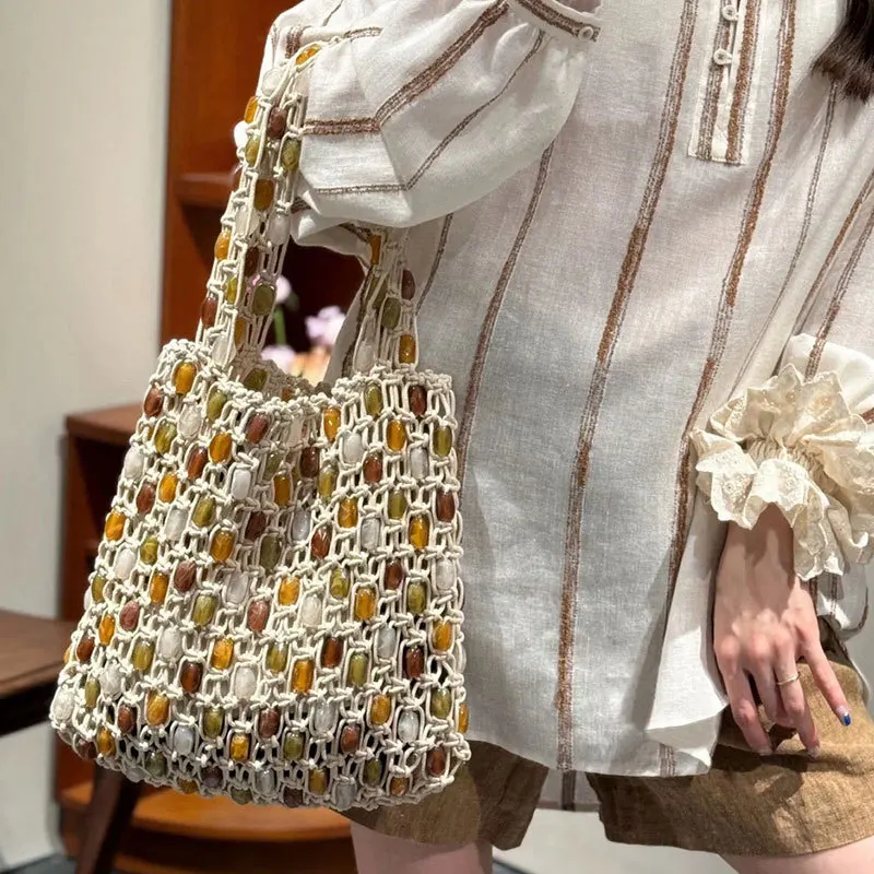 

Hollow Crochet Shoulder Bag Luxury Beads Woven Tote Bags for Women Rope Knitting Handbags Shopper Purses Beach Designer Bag NEW