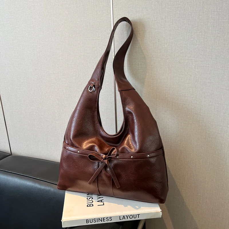 

Leisure Soft PU Underarm Bag for Women Autumn New Commute Versatile Travel One Shoulder Bags Korean Fashion Bow Rivet Tote Bags
