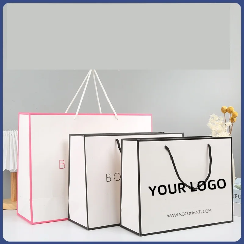 10/100 pezzi Logo personalizzato grande borsa per la spesa in carta bianca con bordo nero e manico a nastro per confezione regalo di vestiti