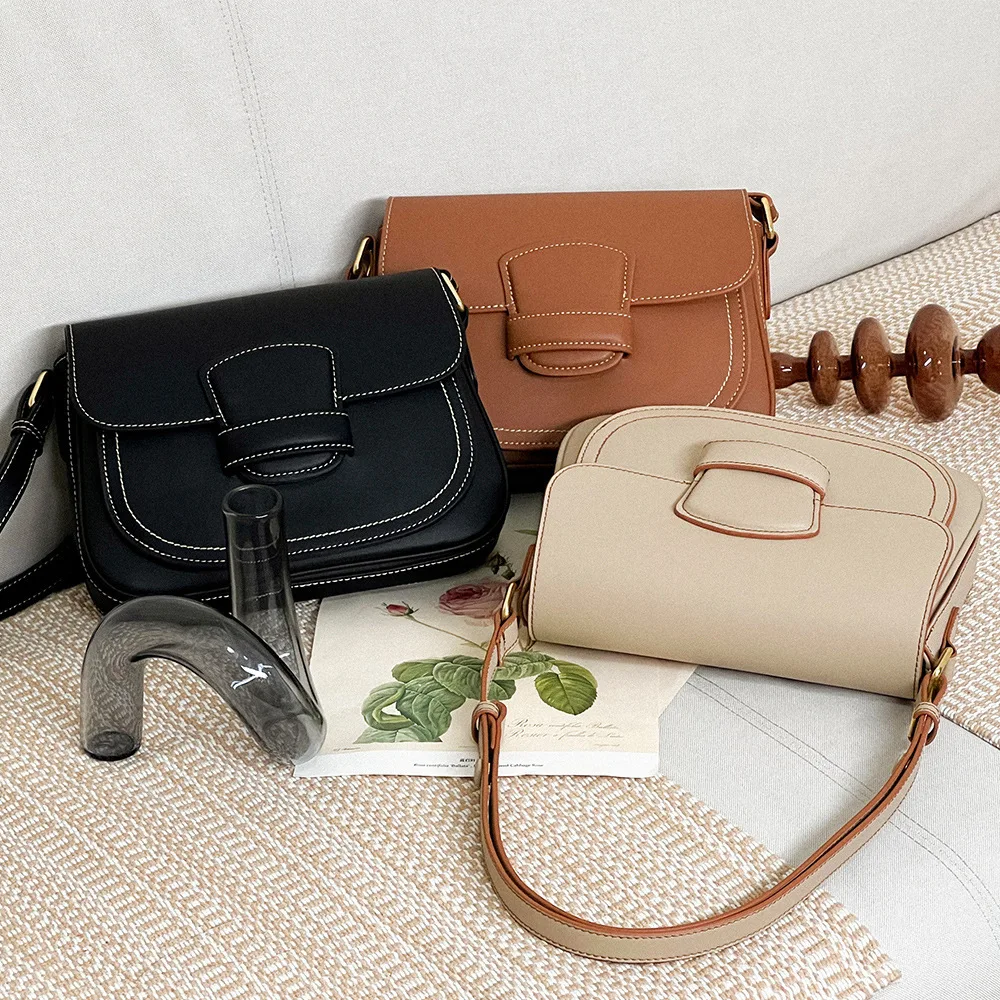 2024 Advanced Exquisite Autumn/winter New Single Shoulder Crossbody Flipped Real Leather Fashionable And Simple Saddle Bag