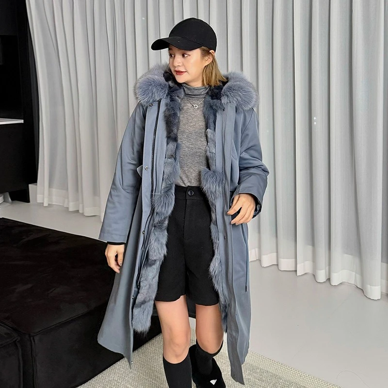 Le nouveau manteau d'hiver en fourrure semblable à du renard, veste mi-longue avec Parka détachable de Pai Pai est à la mode et au chaud pour les femmes