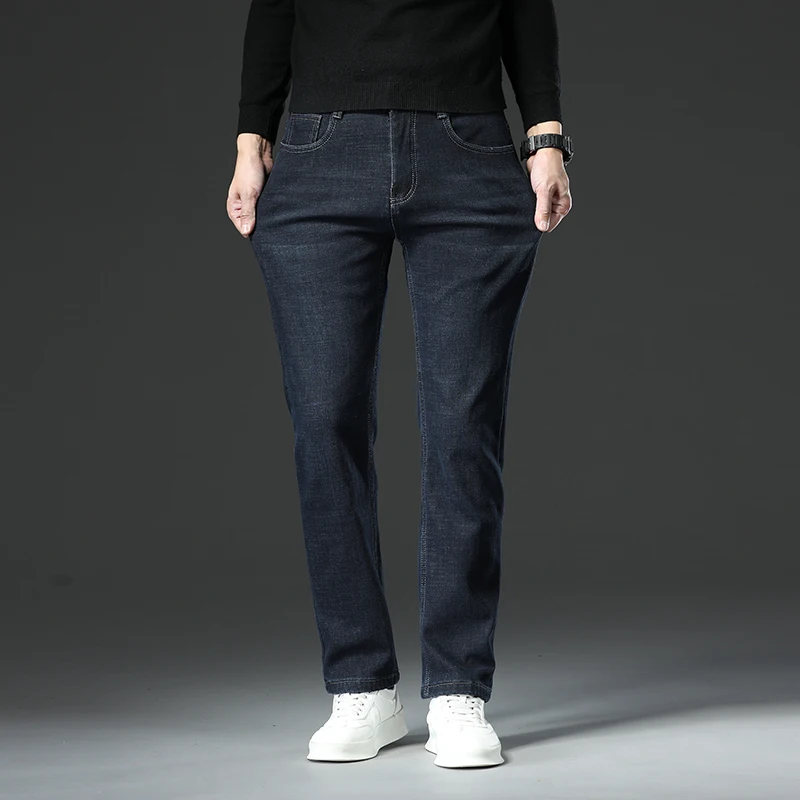 جينز شتوي من الصوف لعام 2025 للرجال دافئ مخملي سميك فضفاض من قماش الدنيم بنطلون كلاسيكي غير رسمي للأعمال باللون الأسود والأزرق
