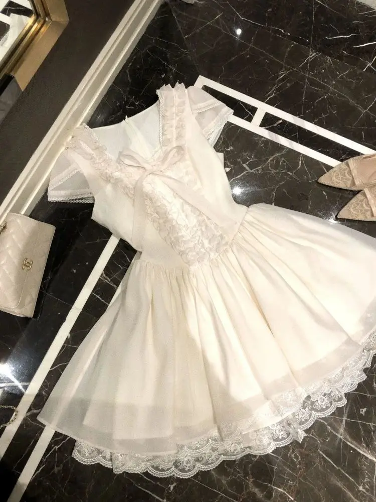 فستان الأميرة الحلو الصيفي الفرنسي الأنيق للنساء بأكمام قصيرة ورقبة مستديرة مع فيونكة دانتيل فستان حفلات صغير أنيق ملابس عصرية