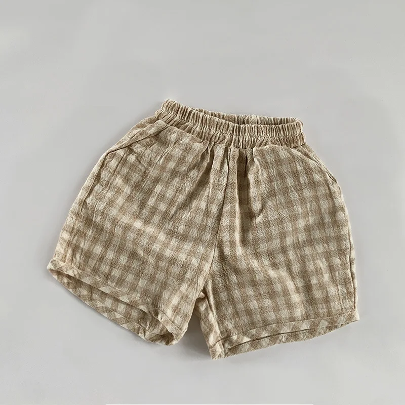 Ropa de estilo coreano para niños pequeños, pantalones cortos sueltos de verano 2025, pantalones a rayas a cuadros para niños